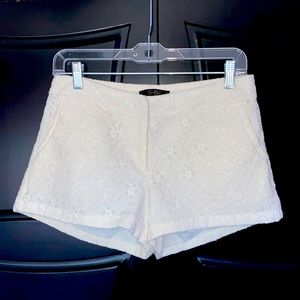 Jessica Simpson off-white lace shorts.